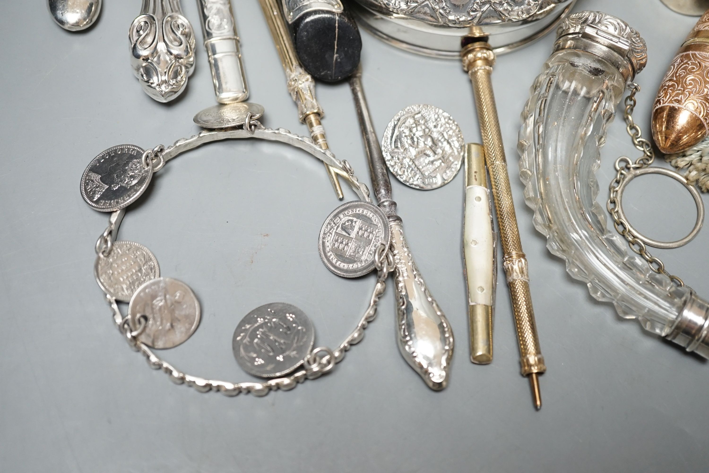 A mixed group of mainly small silver to include two magnifying glasses, a hip flask, silver-handled shoe horns, Georgian snuff box, scent flask etc, some a.f.